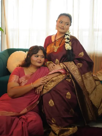 A classic portrait of the two models from our Ganpati shoot, showcasing their traditional makeup and attire.