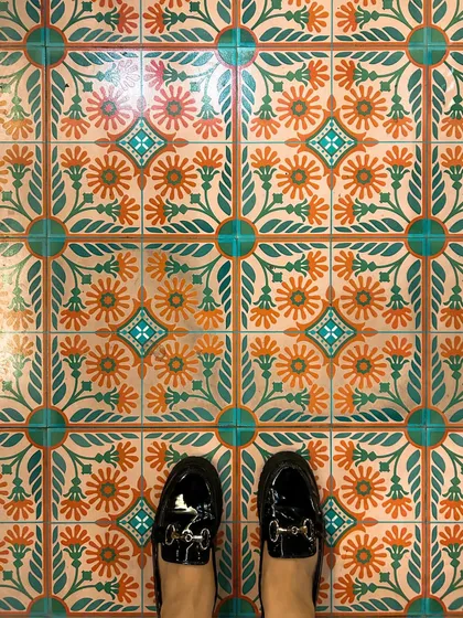 I have a thing for beautiful floors, and the tiles at Rose Cafe are gorgeous. This "from where I stand" shot is a great way to show off a cool design detail and my personal style.