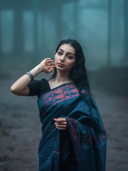 A direct and engaging portrait from the misty forest shoot.