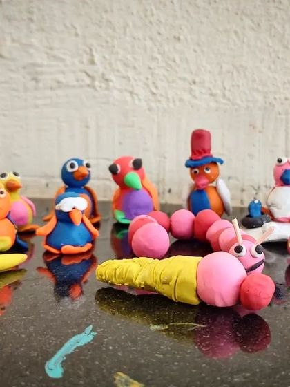 I am so proud of how beautifully these small kids sculpted these clay figures. Look at the little hats and umbrellas.