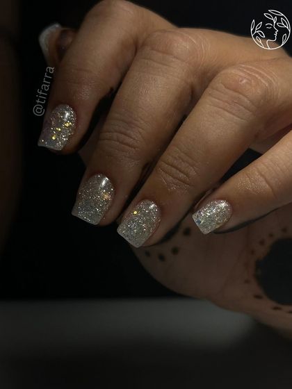Another angle of the sparkling glitter nails, perfect for any party or celebration.