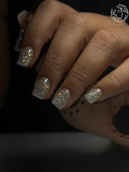 Another angle of the sparkling glitter nails, perfect for any party or celebration.