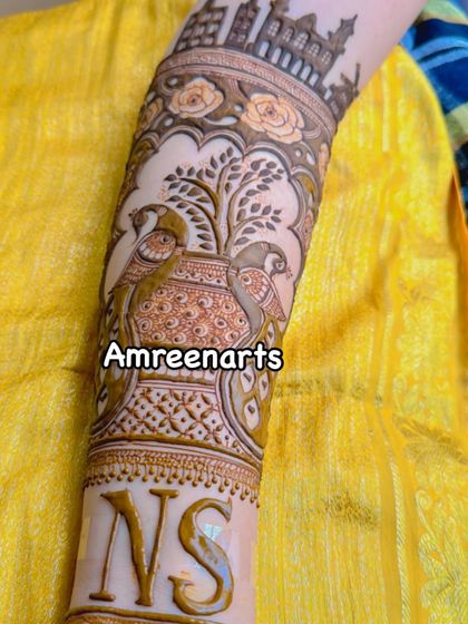 The other arm of the destination-themed design, featuring personalized initials 'NS' and a city skyline.