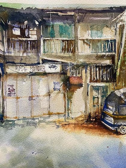 A watercolor painting capturing a sunny afternoon scene in a quiet lane. The contrast of the old building, the closed shops, and the parked auto-rickshaw tells a story of everyday life.