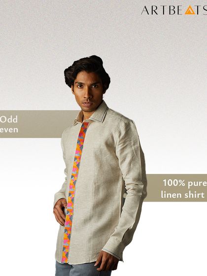 The Odd Even men's shirt in 100% pure linen. This design features a unique placket with a colorful, geometric art detail, adding a playful and unexpected element to a classic long-sleeve shirt.