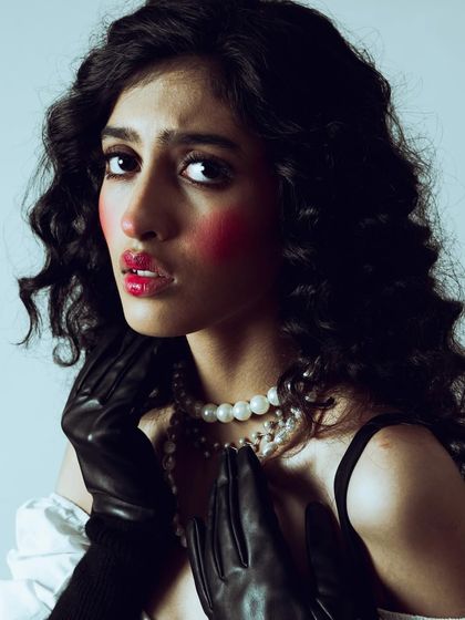 An intense and slightly fearful expression. This close-up captures the emotion of the character, showing my ability to direct models to achieve a specific narrative goal in an editorial.