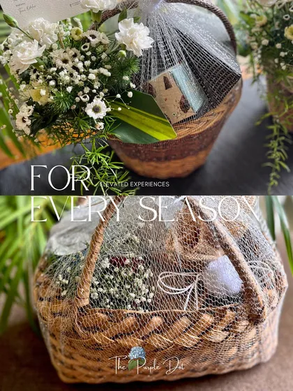 Curated experiences for every season. These baskets show my signature style of combining florals and gifts under a delicate net wrap for an elegant finish.