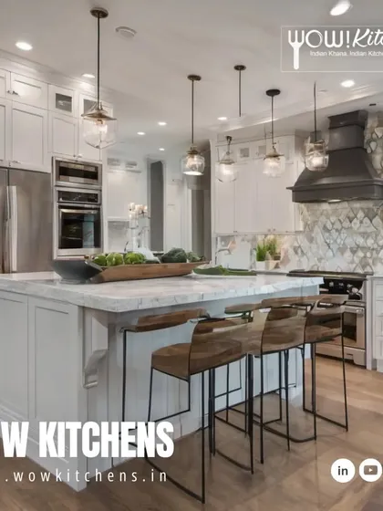 A beautiful example of a modern farmhouse luxury kitchen. This design includes a large island with seating, classic white cabinetry, a stunning patterned backsplash behind the range, and elegant glass pendant lights.