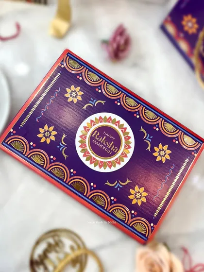 My Rakhi special 'The Sweet Box' with a modern Indian twist. It includes Pista Mafroukeh, Hazelnut Mafroukeh with Nutella, and my unique Besan Ladoo with Dark Chocolate Ganache.