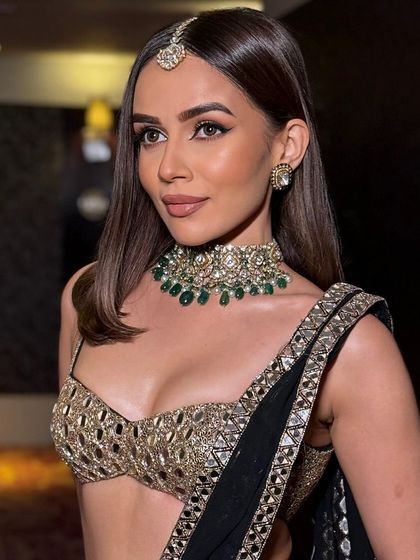 Natural glowing skin and an impactful winged liner for Komal Pandey. This look is all about clean lines and radiant skin.