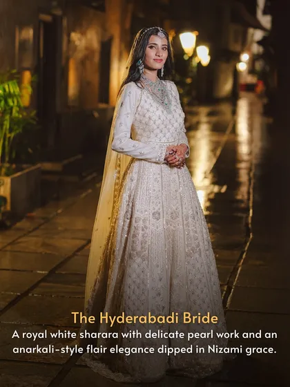 Representing the Nizami elegance of Hyderabad, this bride wears a royal white sharara with an Anarkali-style flair. The outfit is adorned with delicate pearl work, perfect for a Nikah ceremony.