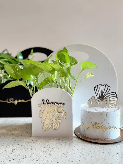 Here are my two Father's Day hamper options side-by-side. You can choose between a black or white acrylic plant holder to go with a custom-designed half-kg cake.
