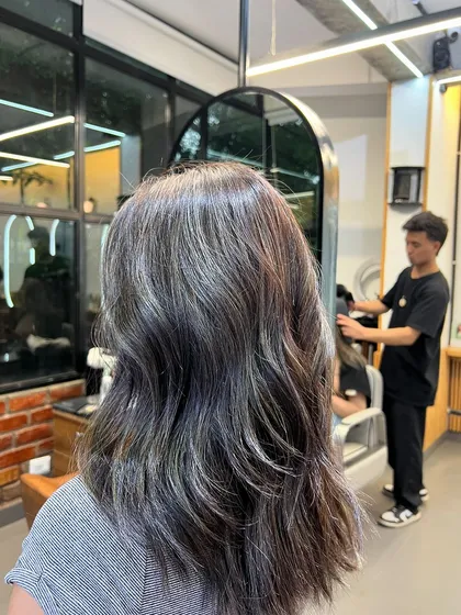 A final look at the medium ash blonde babylights, showing the beautiful, subtle contrast and healthy shine.