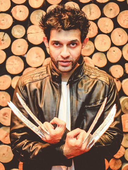 I love any chance to fully transform. Here I am as Wolverine for a Halloween event. It shows my commitment to creating a character, right down to the props.