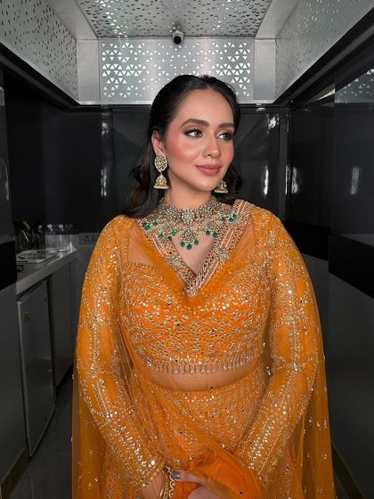 A candid shot of the Roka bride, her smile lighting up the room.