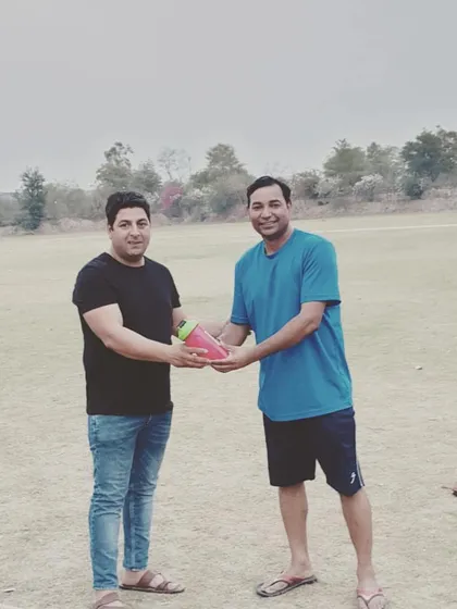 Recognizing top performance after the match. We believe in celebrating individual contributions that lead to team success, a practice we encourage in our corporate cricket programs.