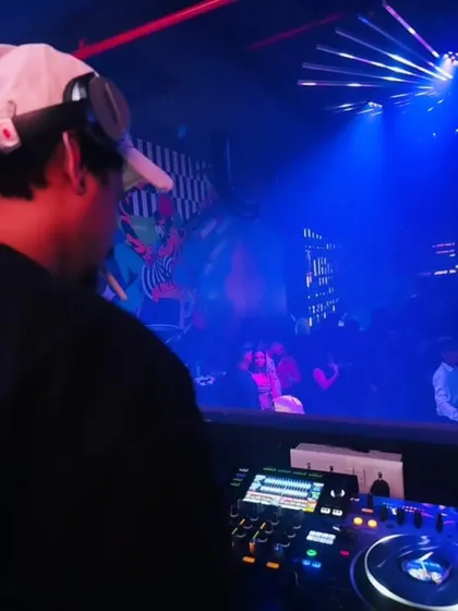 Here you can see my Pioneer DJ setup in action during a busy club night. I use top-tier equipment to ensure every mix is clean and powerful.