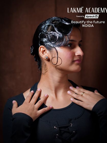 Another angle of the vintage hairstyle, showing the clean lines and sculptural quality of the waves.