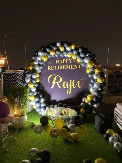 A full view of the rooftop retirement party setup.