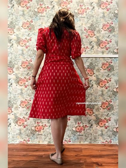 The back view of my red Ikat Angrakha dress, showing the wrap detail. I focus on making sure my designs look beautiful from every angle.