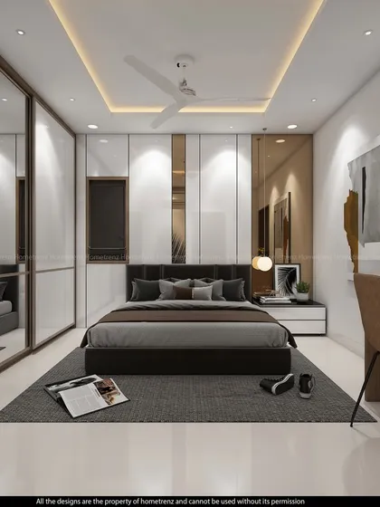 The combination of a mirrored wardrobe and a white panel wardrobe in this bedroom adds visual interest and ample storage.