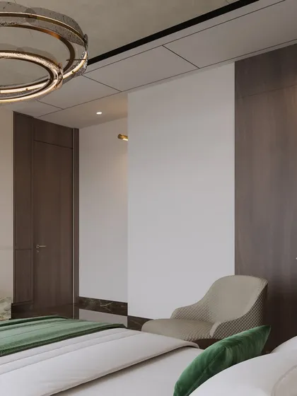 A perspective shot showing the room's layout and the contrast between the dark wood wall and the bright, white walls.