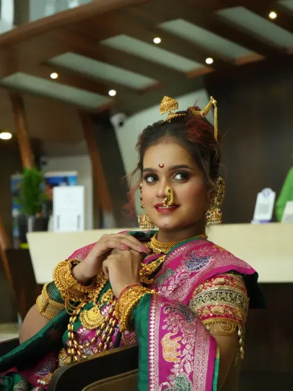 A confident and radiant Peshwai bride. Our training focuses on creating looks that are not only beautiful in photos but also comfortable and long-lasting for the bride throughout her special day.