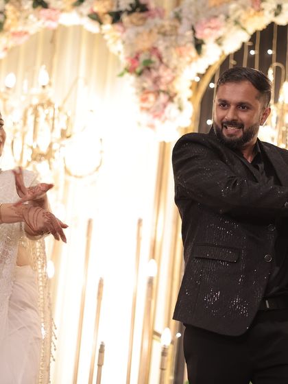 The bride and groom sharing a dance. We work to make sure every performance is filled with genuine smiles and connection.