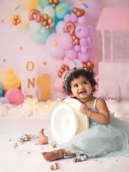 No words for how amazing this little bundle of love was. She had the best time playing with her cake and stand during her sweet-treats-themed first birthday shoot.