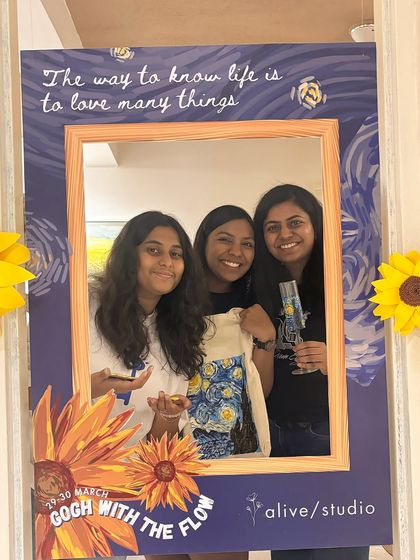 Happy faces from our Van Gogh celebration. These three friends are posing in our themed photo booth after creating their own Starry Night inspired art.
