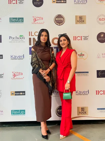 Posing with another stylish guest at the IICI Image Fiesta. It's wonderful to be in a room full of people who understand the power of a well-crafted image.