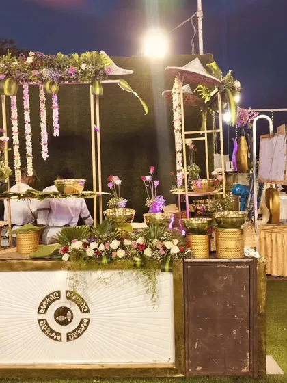A wide shot of my salad bar setup at dusk, showing how the integrated lighting makes the station a focal point of the event space.