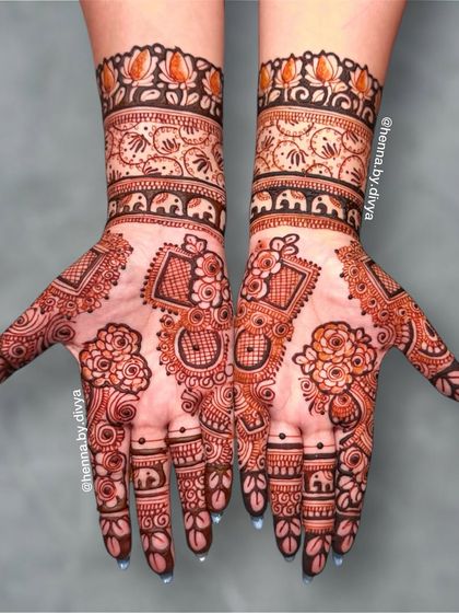 A modern and chic engagement design. This piece uses geometric shapes and floral patterns to create a unique, asymmetrical look.