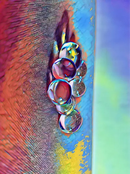 'Create Forget'. A digital artwork exploring texture and light. The glossy, marble-like spheres contrast with the rough, sandy background in this colorful composition.