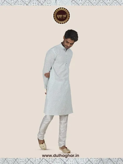 Elevate your style with this premium light blue patterned kurta, shown in a full-length, dynamic pose.
