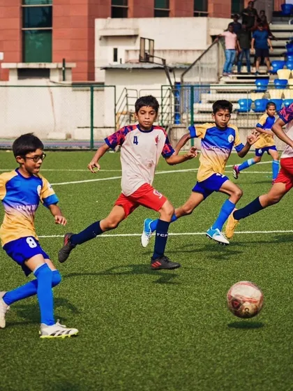 A dynamic action shot showing our U13 players on the attack during the Thane Youth League quarterfinals.