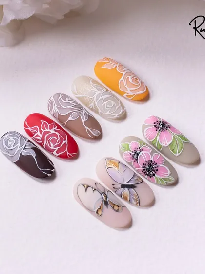 This set features elegant roses and butterflies, combining two classic nail art motifs.