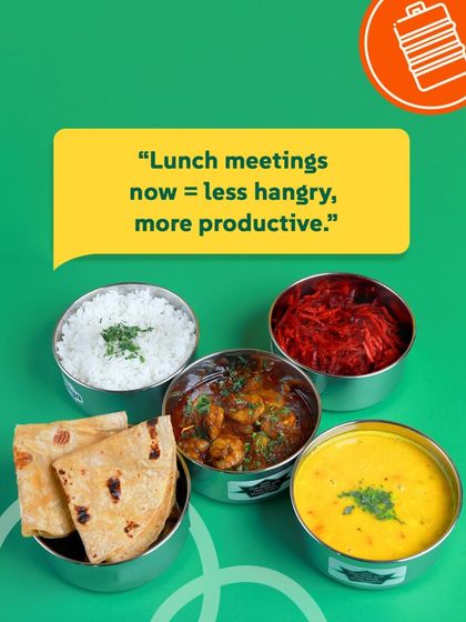 Lunch meetings are now less hangry and more productive with our balanced veg tiffins. This one has a tasty shrimp curry, dal, rice, salad, and rotis. Wait, that's not veg! Let's call it a delicious meal.
