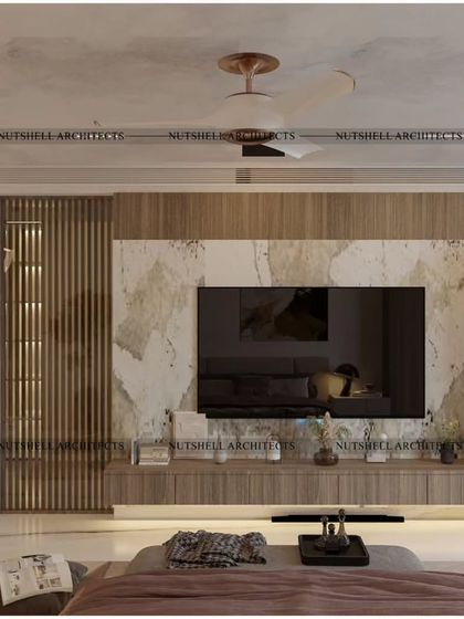 The TV wall in this bedroom combines a bookmatched marble panel with fluted wood details and an integrated vanity table. This multi-functional design is both practical and visually stunning.