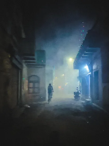 a foggy street scene at night in banaras. the mood and atmosphere in this shot are what i aim to capture in my more stylistic design projects.