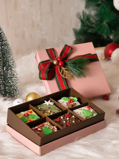 Another look at our handcrafted Christmas brownies, showcasing the festive designs. They are fudgy, delicious, and made to spread the sweetest holiday cheer.
