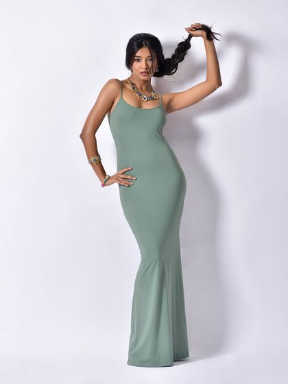 A playful and confident pose, perfect for a brand that wants to project a fun and stylish image.