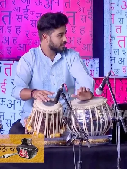 A close-up shot from the Sahitya AajTak performance.