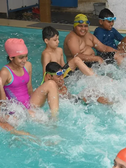 Kids making a huge splash together. Our pool is perfect for group fun and games, with ample space for everyone to play safely.