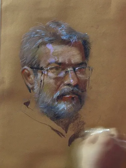 A close-up of the pastel portrait of my guru, Shri Vasudevji Kamath. You can see the fine details in the eyes and the texture of the beard, achieved through careful layering of colours.