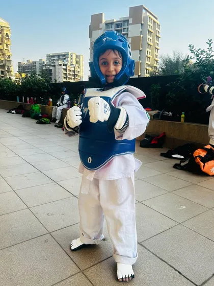 Another young warrior, smiling and ready for his sparring session.