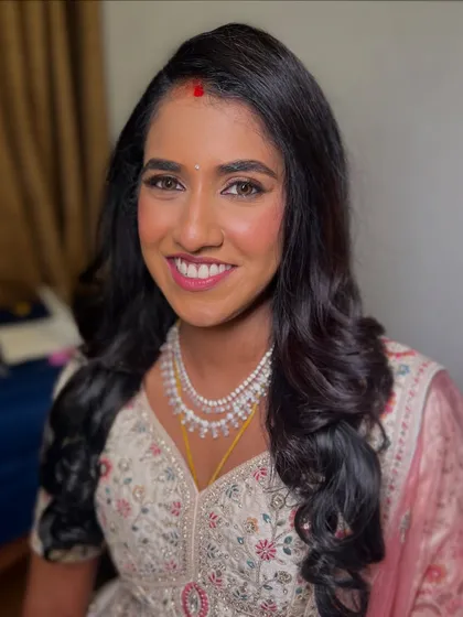 I believe in celebrating every skin tone. For this beautiful bride with a dusky complexion, I focused on creating a warm, golden-hour glow that enhances her natural radiance, proving that the right makeup makes every bride shine.