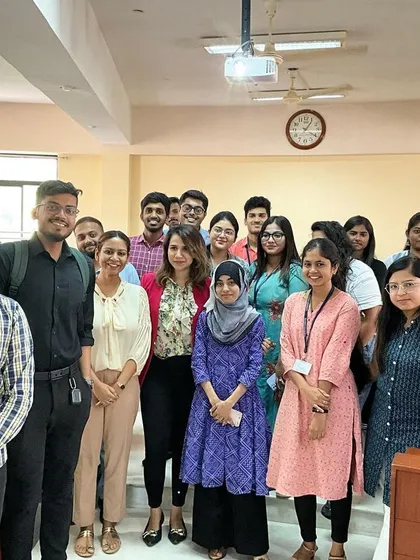 A group photo with students after a session on body language. It's amazing to see their confidence grow as they learn how to use posture and non verbal cues to their advantage.