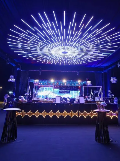 For this event, I designed a custom LED ceiling installation that mimicked a starburst, creating a dazzling focal point above the main bar.