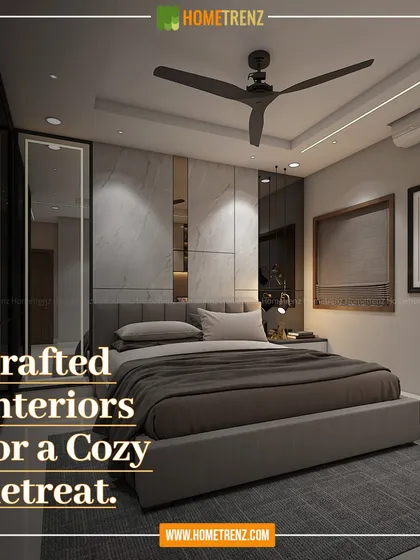 I believe a bedroom should be a cozy retreat. This space combines a custom-upholstered bed, a marble-finish feature wall with integrated lighting, and a mirrored wardrobe to create a sense of sophisticated comfort and tranquility.